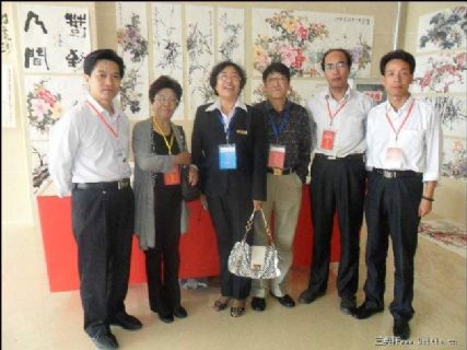马翰画家和原国务院副主任顾洪涛在一起